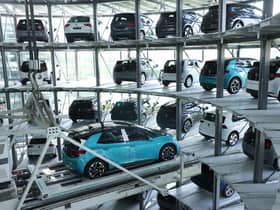 Electric cars are stacked in a storage tower following assembly at the Gläserne Manufaktur production facility in Dresden, Germany (Picture: Sean Gallup/Getty Images)