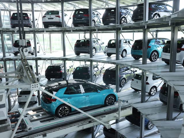 Electric cars are stacked in a storage tower following assembly at the Gläserne Manufaktur production facility in Dresden, Germany (Picture: Sean Gallup/Getty Images)
