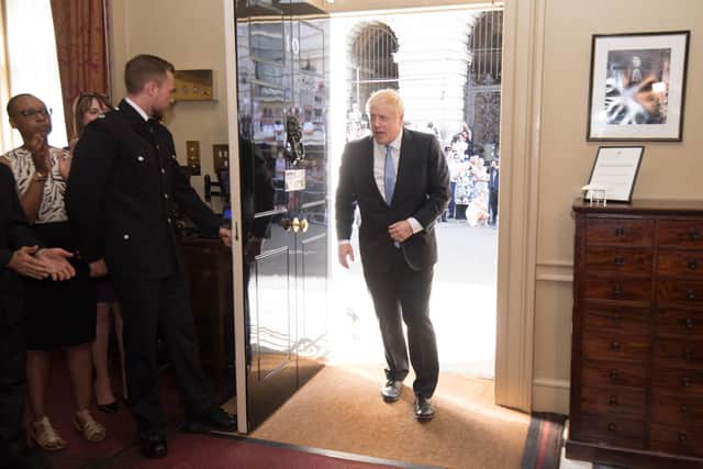New Prime Minister Boris Johnson arrives in 10 Downing Street on July 24, 2019. (Photo by Stefan Rousseau - WPA Pool/Getty Images)