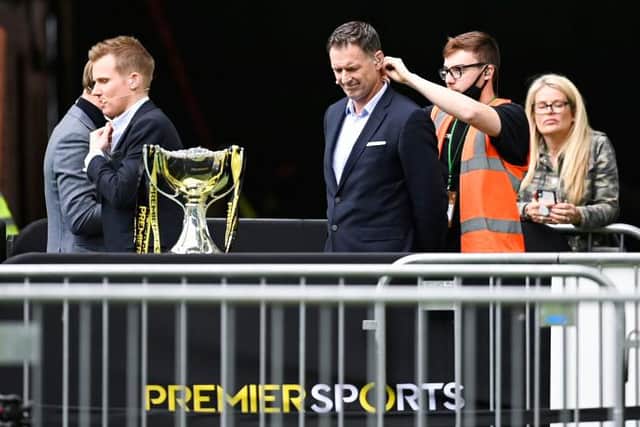 Pundits have been in the spotlight this week including Chris Sutton (centre) pictured during the Premier Sports Cup previous round match between Celtic and Hearts on August 15. (Photo by Rob Casey / SNS Group)