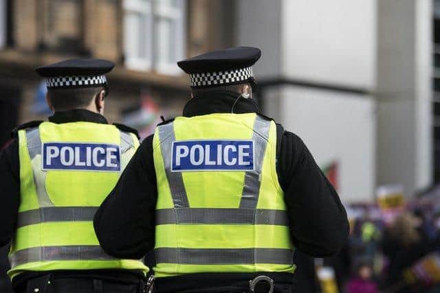 Stock image of two Police Scotland officers.