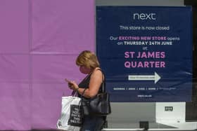 A sign in the former Next store directs customers to the St James Quarter   Picture: Lisa Ferguson