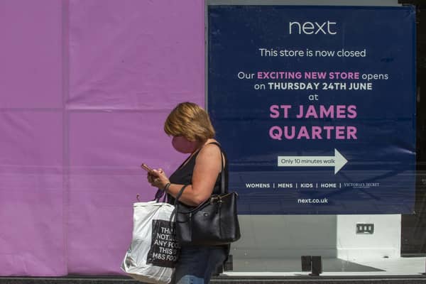 A sign in the former Next store directs customers to the St James Quarter   Picture: Lisa Ferguson