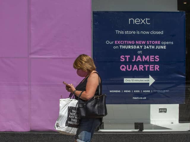 A sign in the former Next store directs customers to the St James Quarter   Picture: Lisa Ferguson