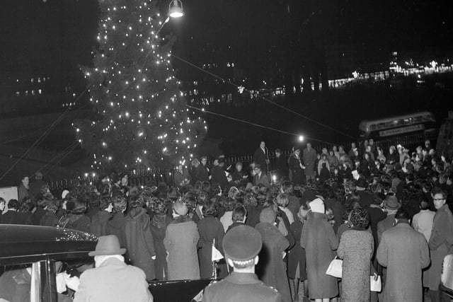 The lights on the Mound Christmas Tree are switched on in 1963.