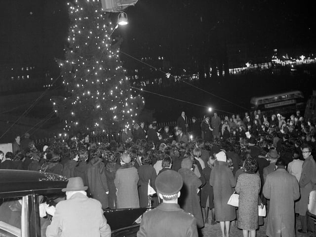 The lights on the Mound Christmas Tree are switched on in 1963.
