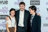 Lead actors Frankie Corio and Paul Mescal, with Charlotte Wells, the writer and director of Aftersun, which opened the 2022 Edinburgh International Film Festival. 