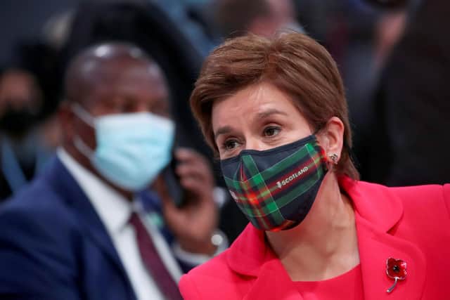 Scotland's First Minister Nicola Sturgeon was present the opening of the UN Climate Change Conference COP26 at SECC, and later attended a lavish evening reception at Kelvingrove Art Museum and Gallery. (Photo by Yves Herman - WPA Pool/Getty Images)