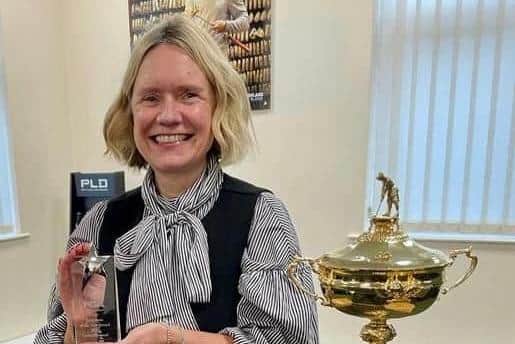 Lesley Barnard shows off her PGA National Employee of the Year Award. Picture: PGA in Scotland