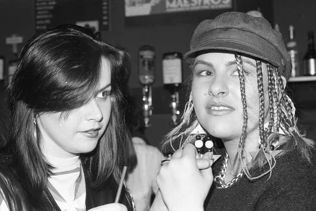 Two women at Maestro's in Glasgow around 1985 - one of the clubs with the strictest door policy around. The club channelled a different 1980s atmosphere with alternative fashion and sounds championed.  PIC: Photo by Simon Clegg.