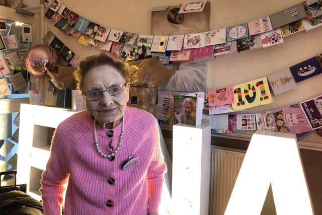 Edna Clayton celebrating her 101st birthday surrounded by more than 30,000 cards sent from around the world.