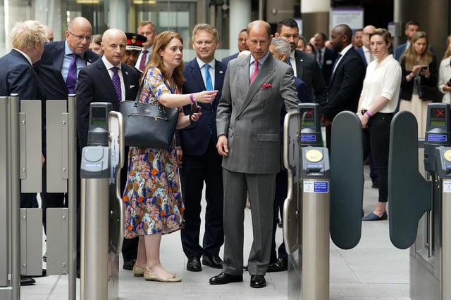 The Earl of Wessex uses an oyster card to go through barriers to ride on a Elizabeth Line train at Paddington station in London, to mark the completion of London's Crossrail project.