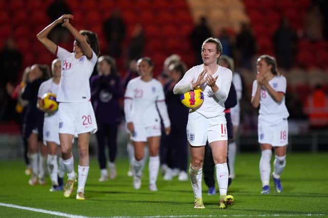 England's Lauren Hemp celebrates with the match ball after a 20-0 win over Latvia.