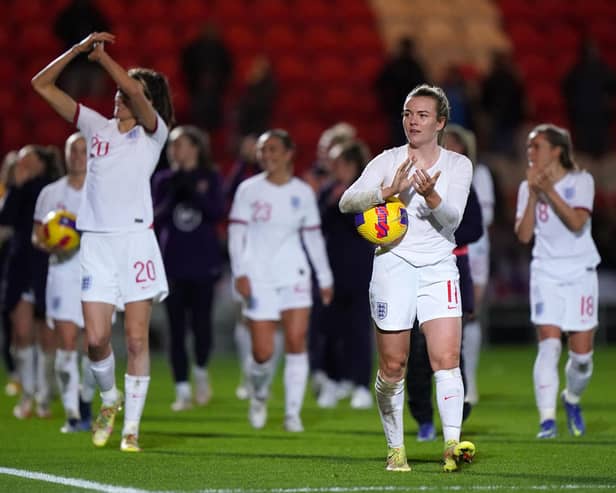 England's Lauren Hemp celebrates with the match ball after a 20-0 win over Latvia.