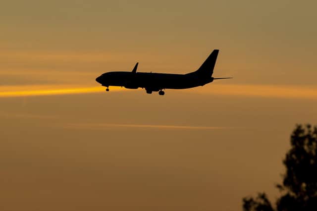 A plane coming in to land at an Airport. PIC: Peter Byrne/PA Wire