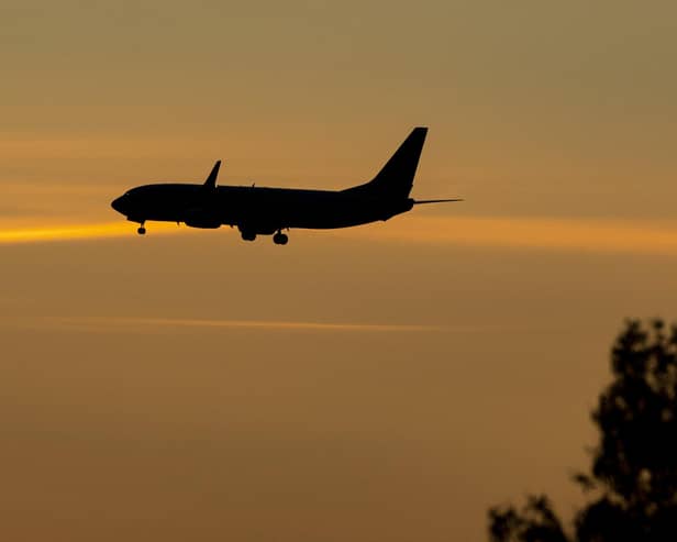 A plane coming in to land at an Airport. PIC: Peter Byrne/PA Wire