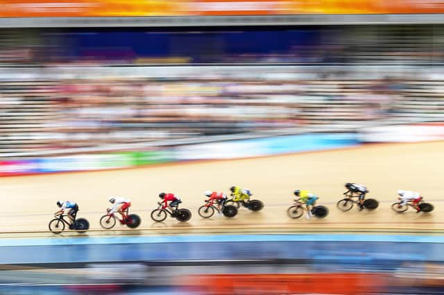 Athletes compete during Men's 15km Track Cycling Scratch Race earlier today