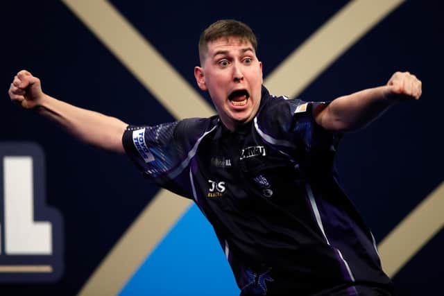 William Borland celebrates his nine dart finish against Bradley Brooks at the William Hill World Darts Championship at Alexandra Palace on December 17, 2021 (Photo by Luke Walker/Getty Images)