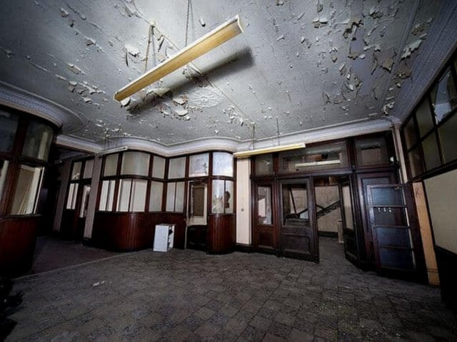 While the drydock that used to accompany the offices was filled in during the 1960s, the Art Deco Meadowfield Shipyard Offices remain. David Tod and John McGregor, proclaiming themselves the “fathers of iron shipbuilding on the Clyde,” set up shop at Meadowfield, where the River Kelvin joins the Clyde. Tod and McGregor built one of the first drydocks in Scotland, and also a slip dock for repairs. David and William Henderson, who owned engineering works in Finnieston, bought the yard from Mr Tod Jr in 1873 after the deaths of the original founders, before selling to Harland & Wolff in 1917. The depression between the two World Wars pushed it into closure in 1935. The offices, once occupied by several other companies, now lie empty.