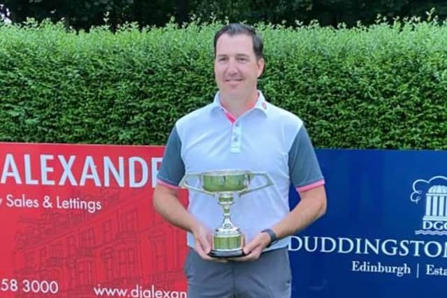 Royal Musselburgh's Craig Johnstone with the Lothians Champion of Champions Trophy after his win in the final at Duddingston.