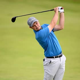 Jack McDonald plays his second shot on the 16th hole in a practice round prior to the 152nd Open at Royal Troon. Picture: Ross Kinnaird/Getty Images.