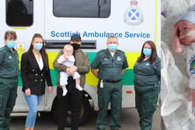 A Scottish baby born premature meets the crew who saved his life.