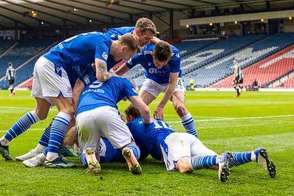 St Johnstone players surround Glenn Middleton after the substitute made it 2-0. (Photo by Alan Harvey / SNS Group)