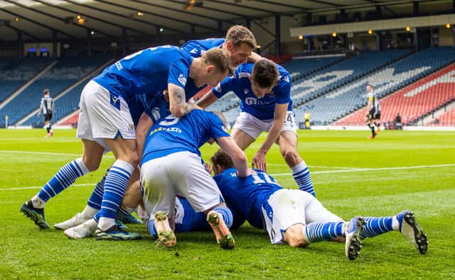 St Johnstone players surround Glenn Middleton after the substitute made it 2-0. (Photo by Alan Harvey / SNS Group)