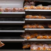 The odd half-empty shelf is no excuse to start panic-buying and making the situation worse (Picture: Chris J Ratcliffe/Getty Images )