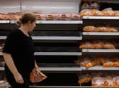 The odd half-empty shelf is no excuse to start panic-buying and making the situation worse (Picture: Chris J Ratcliffe/Getty Images )