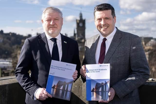 Angus Robertson with Independence Minister Jamie Hepburn with one of the independence papers