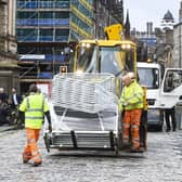 Barriers are beginning to be put on place on the Royal Mile in preparation of the Queen's body arriving in Edinburgh. Picture: Lisa Ferguson