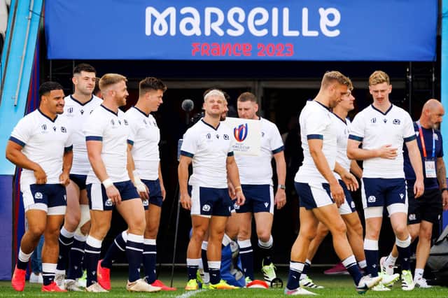 Scotland winger Darcy Graham, centre, and team-mates train at the Velodrome Stadium in Marseille ahead of Sunday's Rugby World Cup match against South Africa. (Photo by CLEMENT MAHOUDEAU/AFP via Getty Images)