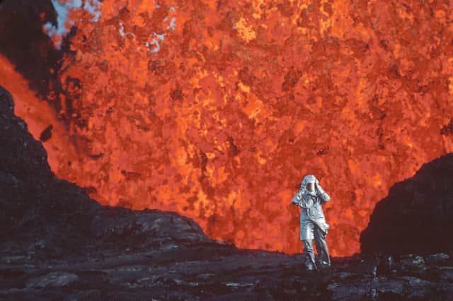 Katia Krafft wearing aluminized suit standing near lava burst at Krafla Volcano, Iceland PIC: Image'Est