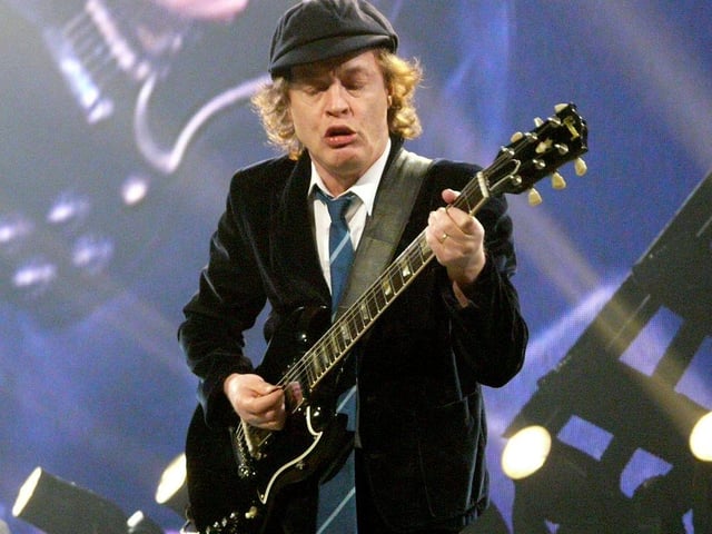 Rock giants AC/DC may have formed in Australia, but their Scottish lineage is clear. Founding members Angus (pictured) and Malcolm Young. were born in Glasgow, while former front man Bon Scott, who died in 1980, was born in Kirriemuir.