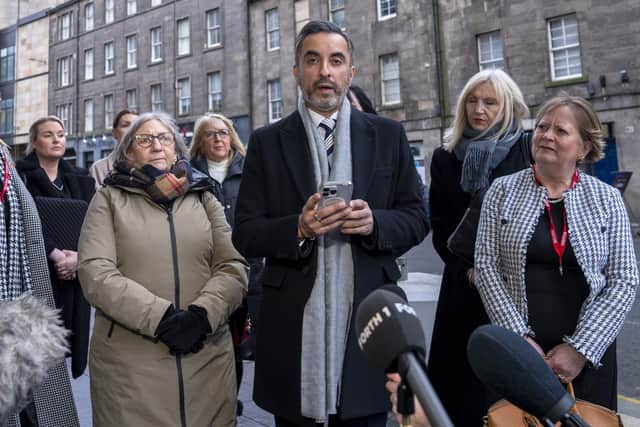 Solicitor Aamer Anwar with members of the Scottish Covid Bereaved group speaking to the media ahead of the UK Covid-19 Inquiry hearing at the Edinburgh International Conference Centre (EICC). Picture: Jane Barlow/PA Wire