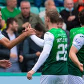 Christian Doidge, left, celebrates with Jake Doyle-Hayes after scoring in Hibs' 3-0 win over Ross County.