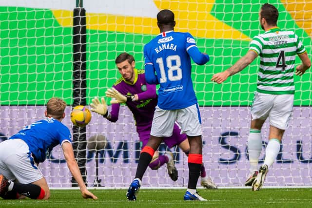 GLASGOW, SCOTLAND - OCTOBER 17: Celtic's Vasilis Barkas is unable to prevent Connor Goldson's opener going past him during the 2-0 derby defeat that marked the beginning of the club's domestic slide in their own environs. Photo by Alan Harvey / SNS Group)