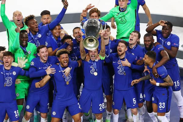 Cesar Azpilicueta of Chelsea lifts the Champions League Trophy following victory in the UEFA Champions League Final between Manchester City and Chelsea FC at Estadio do Dragao on May 29, 2021 in Porto, Portugal. (Photo by Michael Steele/Getty Images)