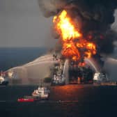 Fire boat response crews battle the blazing remnants of the off shore oil rig Deepwater Horizon in 2010. The explosion  killed 11 workers and polluted the coastline from Louisiana to Florida