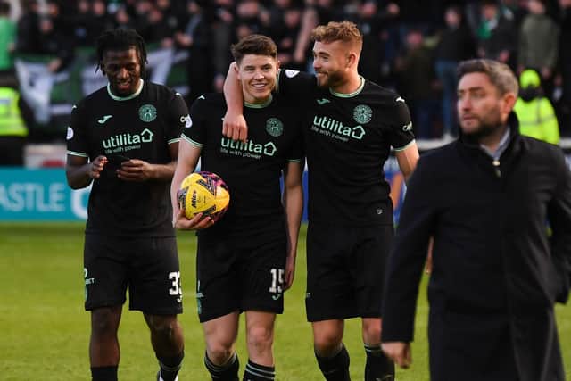 Hibs duo Nisbet and Ryan Porteous come off the pitch victorious at Fir Park.