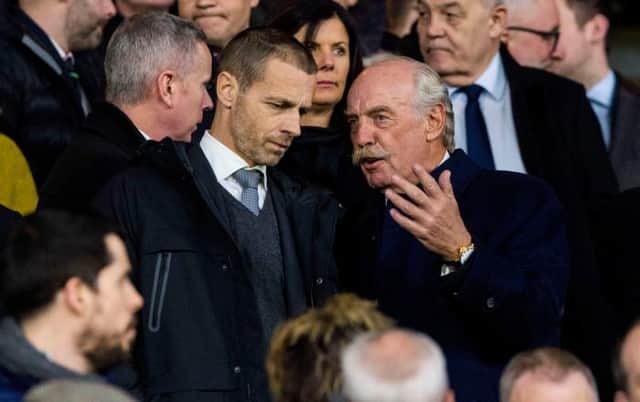 UEFA President Aleksander Ceferin (left) speaks with Celtic majority shareholder Dermot Desmond during his visit to Glasgow for the Europa League match between Celtic and Valencia in February 2019. (Photo by Alan Harvey/SNS Group).