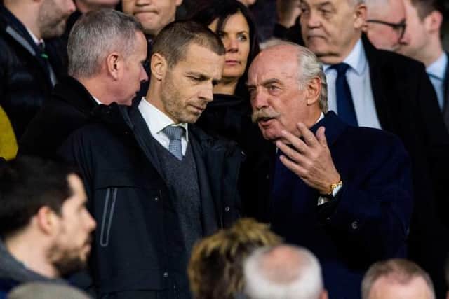 UEFA President Aleksander Ceferin (left) speaks with Celtic majority shareholder Dermot Desmond during his visit to Glasgow for the Europa League match between Celtic and Valencia in February 2019. (Photo by Alan Harvey/SNS Group).