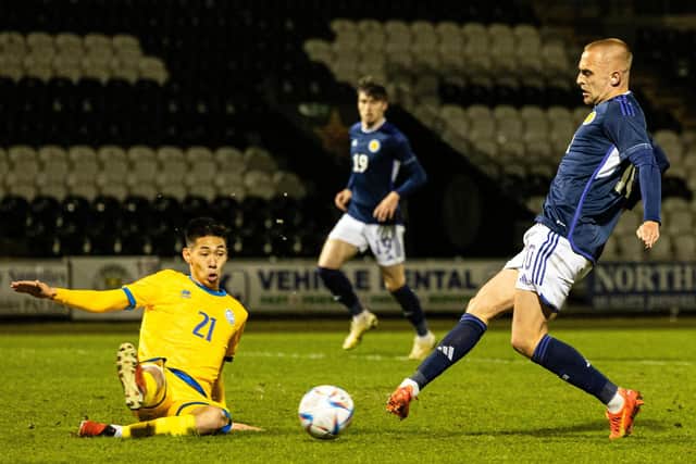 Scotland's Lewis Fiorini scores to make it 4-0 against Kazakhstan.