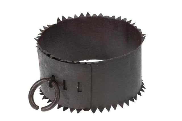 A 17th Century iron collar from Fife used as an instrument of torture on those accused of witchcraft. It has been used to illustrate the case of a woman accused of being a lesbian, with the authorities later treating her as a witch.PIC: NMS.