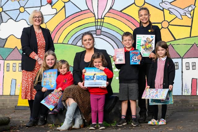 (L-R) Dalmeny Primary School Headteacher Gail Middlemiss, Mia Shon, Oliver Smurthwaite, Ralph Sayer Head of Estate AgencyTzana Webster, Pippa Lewis, Logan Wallace, Elijah Mitchell(tall one at the back) and Sophie Taylor.