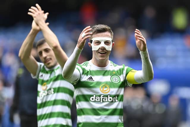 Celtic captain Callum McGregor celebrates at full time against Rangers.