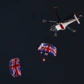 Gary Connery and Mark Sutton parachute into the stadium as part of short James Bond film featuring Daniel Craig and The Queen during the Opening Ceremony of the London 2012 Olympic Games at the Olympic Stadium on July 27, 2012.