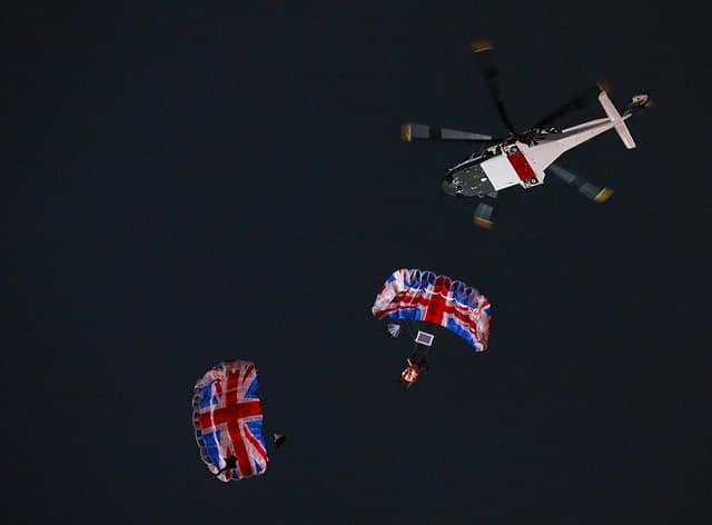 Gary Connery and Mark Sutton parachute into the stadium as part of short James Bond film featuring Daniel Craig and The Queen during the Opening Ceremony of the London 2012 Olympic Games at the Olympic Stadium on July 27, 2012.