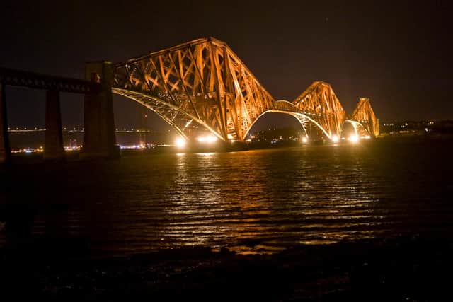 Forth Rail Bridge lit up 
